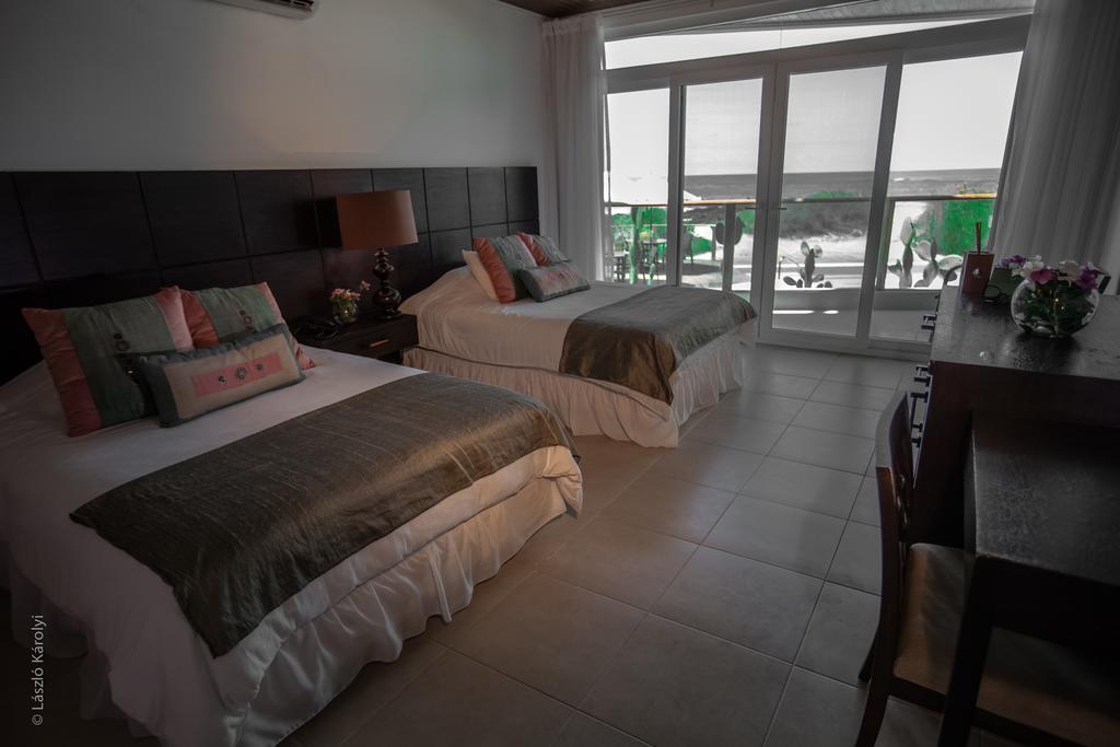 Iguana Crossing Boutique Hotel Puerto Villamil Extérieur photo